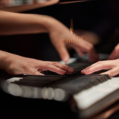 Student playing the piano
